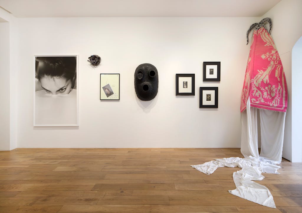 Michel François
Le monde et les bras, 1996
Black and white photograph
180 x 120 cm

Matthew Lutz‑Kinoy
Always surprised, 2018
Ceramic and glaze
35 x 30 x 13 cm

Camille Henrot
Untitled (Study for Monday), 2015
Pastel and collage on paper
64,8 x 49,5 cm

Ugo Rondinone
moonrise. west. april, 2004
Cast polyurethane
97 x 68 x 29 cm

Pierre Molinier
Le Chaman, 1970
Black and white silver print
16 x 11 cm

Pierre Molinier
Untitled (“L’Œuvre, le peintre et son fétiche” series), undated
Black and white silver print
12,5 x 17,5 cm

Pierre Molinier
“Pantomine Céleste” (Photomontage for “Le Chaman et ses créatures”), undated
Black and white silver print
12 x 17 cm

Petrit Halilaj
Do you realise there is a rainbow even if it's night!? (white), 2017
Dyshek carpet from Kosovo, Flokati, polyester, stainless steel, brass
Body and wings: 238 x 144 x 26 cm
Height including satin: 385 cm

View of the group show “Mask”, kamel mennour (51 Brook Street), London, 2018

© ADAGP Michel François
© Petrit Halilaj
© ADAGP Camille Henrot
© Matthew Lutz‑Kinoy
© ADAGP Pierre Molinier
© Ugo Rondinone
Photo. archives kamel mennour
Courtesy the artist and kamel mennour, Paris/London
  - © kamel mennour